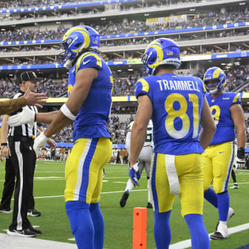 Nov 19, 2023; Inglewood, California, USA; Los Angeles Rams wide receiver Puka Nacua (17) celebrates with head coach Sean McVay after scoring a touchdown in the second quarter against the Seattle Seahawks at SoFi Stadium. Mandatory Credit: Robert Hanashiro-USA TODAY Sports