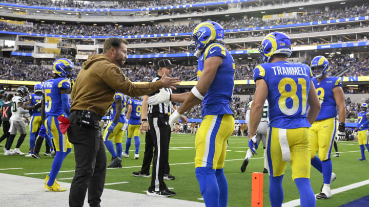 Nov 19, 2023; Inglewood, California, USA; Los Angeles Rams wide receiver Puka Nacua (17) celebrates with head coach Sean McVay after scoring a touchdown in the second quarter against the Seattle Seahawks at SoFi Stadium. Mandatory Credit: Robert Hanashiro-USA TODAY Sports