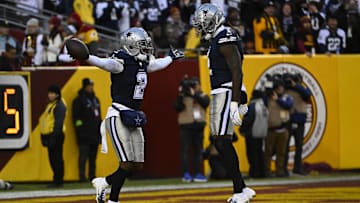 Dallas Cowboys cornerback Jourdan Lewis celebrates after receiving a fumble with safety Jayron Kearse.