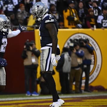 Dallas Cowboys cornerback Jourdan Lewis celebrates after receiving a fumble with safety Jayron Kearse.