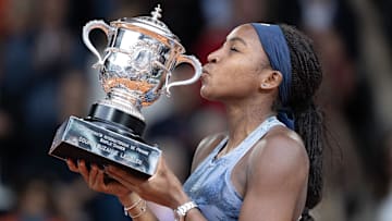 Coco Gauff of the United States kisses the French Open trophy after winning the women's singles final against Aryna Sabalenka