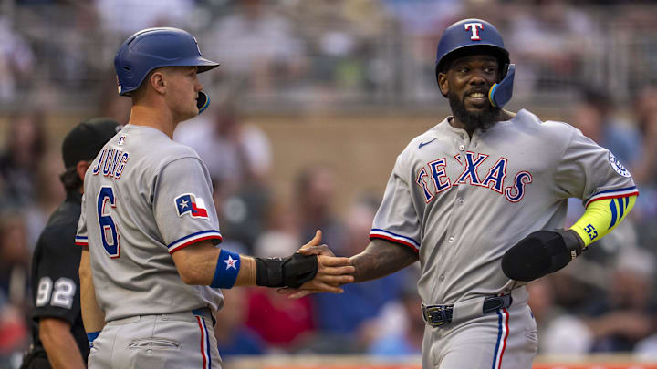 Jun 10, 2025; Minneapolis, Minnesota, USA; Texas Rangers right fielder Adolis Garcia (53) and third baseman Josh Jung (6) celebrate after scoring runs against the Minnesota Twins in the fifth inning at Target Field. Jun 10, 2025; Minneapolis, Minnesota, USA; Texas Rangers right fielder Adolis Garcia (53) and third baseman Josh Jung (6) celebrate after scoring runs against the Minnesota Twins in the fifth inning at Target Field.