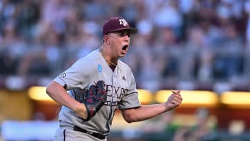 Jun 9, 2024; College Station, TX, USA; Texas A&M pitcher Kaiden Wilson (30) reacts to a double play to close out the fourth inning against Oregon at Olsen Field, Blue Bell Park Mandatory Credit: Maria Lysaker-USA TODAY Sports
