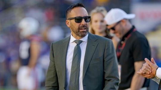 Oct 14, 2023; Baton Rouge, Louisiana, USA;  Sportscaster Joe Tessitore, left, talks with sportscaster Jesse Palmer before a game between the LSU Tigers and the Auburn Tigers at Tiger Stadium. Mandatory Credit: Matthew Hinton-USA TODAY Sports