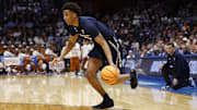 Mar 19, 2025; Dayton, OH, USA; Xavier Musketeers guard Dailyn Swain (3) dribbles in the second half against the Texas Longhorns at UD Arena. Mandatory Credit: Rick Osentoski-Imagn Images