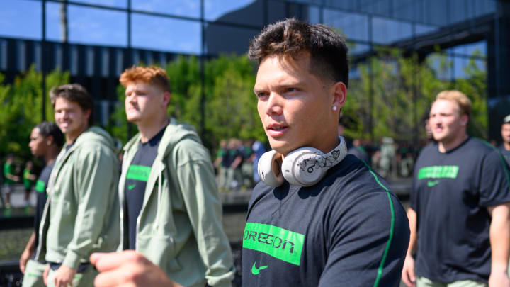 Aug 31, 2024; Eugene, Oregon, USA; Oregon Ducks quarterback Dillon Gabriel (8) arrives with the team before the game against the Idaho Vandals at Autzen Stadium. Mandatory Credit: Craig Strobeck-USA TODAY Sports