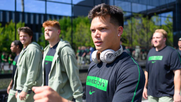 Aug 31, 2024; Eugene, Oregon, USA; Oregon Ducks quarterback Dillon Gabriel (8) arrives with the team before the game against the Idaho Vandals at Autzen Stadium. Mandatory Credit: Craig Strobeck-USA TODAY Sports