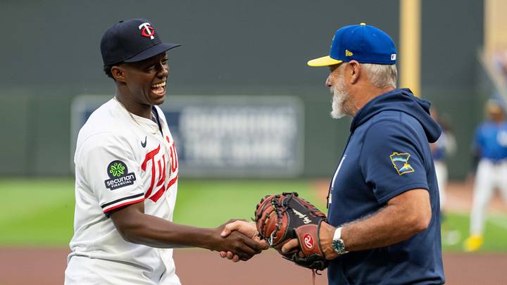 Jul 24, 2026; Minneapolis, Minnesota, USA; Minnesota Twins 2026 first-round draft pick Vahn Lackey throws out a first pitch to manager Derek Shelton (8) prior to the game against the Athletics at Target Field. Mandatory Credit: Jordan Johnson-Imagn Images