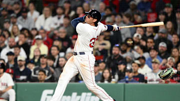 Apr 23, 2025; Boston, Massachusetts, USA; Boston Red Sox first base Triston Casas (36) hits a three-run home run against the Seattle Mariners during the eighth inning at Fenway Park. Mandatory Credit: Brian Fluharty-Imagn Images.
