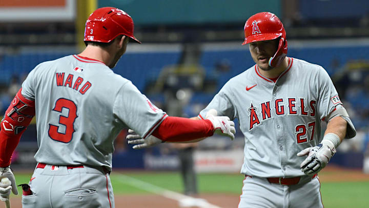 Angels center fielder Mike Trout (27) celebrates with designated hitter Taylor Ward (3) after hitting a solo home run in the first inning against the Tampa Bay Rays at Tropicana Field on April 17, 2024. Angels center fielder Mike Trout (27) celebrates with designated hitter Taylor Ward (3) after hitting a solo home run in the first inning against the Tampa Bay Rays at Tropicana Field on April 17, 2024.