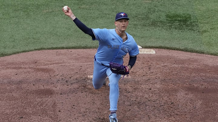 Aug 24, 2024; Toronto, Ontario, CAN; Toronto Blue Jays starting pitcher Bowden Francis (44) pitches to the Los Angeles Angels during the sixth inning at Rogers Centre.