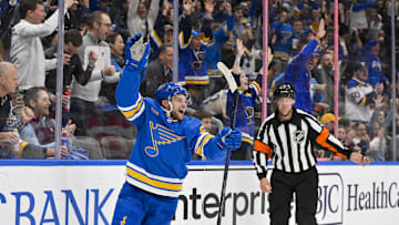 Nov 11, 2025; St. Louis, Missouri, USA; St. Louis Blues left wing Nathan Walker (26) reacts after scoring against the Calgary Flames during the second period at Enterprise Center. Mandatory Credit: Jeff Curry-Imagn Images