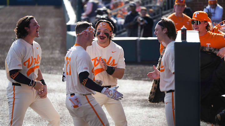 Tennessee catcher Stone Lawless (27) celebrates with the Tennessee baseball team after hitting a home run during a Tennessee baseball game against Samford at Lindsey Nelson Stadium at the University of Tennessee on Sunday, February 23, 2025.
