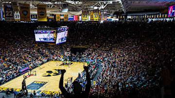 Fans celebrate a 3-pointer by Indiana Fever guard Caitlin Clark (22) on Sunday, May 4, 2025, during a preseason game between the Indiana Fever and the Brazil national team at Carver-Hawkeye Arena in Iowa City. The Indiana Fever defeated the Brazilian National Team, 108-44.