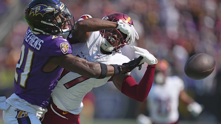 Baltimore Ravens defensive back Brandon Stephens defends a pass intended for Washington Commanders wide receiver Terry McLaurin. Mandatory Credit: Mitch Stringer-Imagn Images