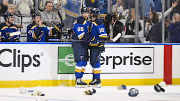 Apr 24, 2025; St. Louis, Missouri, USA; St. Louis Blues left wing Pavel Buchnevich (89) is congratulated by center Robert Thomas (18) after recording a hat trick against the Winnipeg Jets during the third period in game three of the first round of the 2025 Stanley Cup Playoffs at Enterprise Center. Mandatory Credit: Jeff Curry-Imagn Images