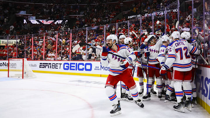 May 26, 2024; Sunrise, Florida, USA; New York Rangers celebrate an overtime goal by center Alex Wennberg (91) to defeat the Florida Panthers in game three of the Eastern Conference Final of the 2024 Stanley Cup Playoffs at Amerant Bank Arena. Mandatory Credit: Sam Navarro-USA TODAY Sports