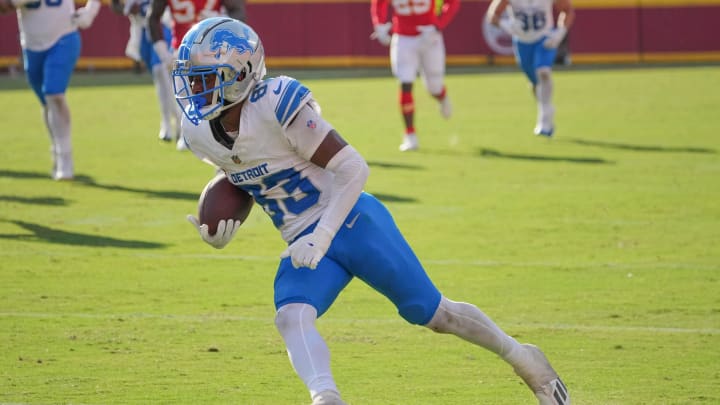 Aug 17, 2024; Kansas City, Missouri, USA; Detroit Lions wide receiver Isaiah Williams (83) runs the ball against the Kansas City Chiefs during the game at GEHA Field at Arrowhead Stadium. Mandatory Credit: Denny Medley-USA TODAY Sports