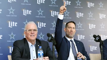 Dallas Cowboys CEO Stephen Jones and head coach Brian Schottenheimer speak to the media at a press conference.