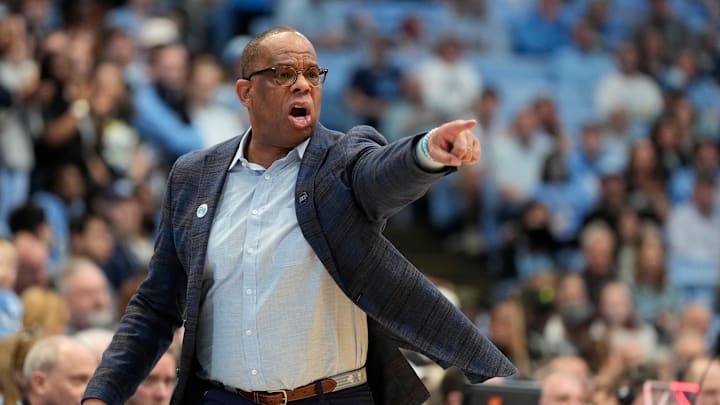 Mar 1, 2025; Chapel Hill, North Carolina, USA;  North Carolina Tar Heels head coach Hubert Davis reacts in the first half at Dean E. Smith Center. Mandatory Credit: Bob Donnan-Imagn Images