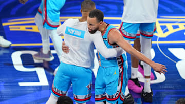 Feb 16, 2025; San Francisco, CA, USA; Shaqís OGs guard Damian Lillard (0) of the Milwaukee Bucks and guard Stephen Curry (30) of the Golden State Warriors celebrate after winning the 2025 NBA All Star Game at Chase Center. Mandatory Credit: Darren Yamashita-Imagn Images