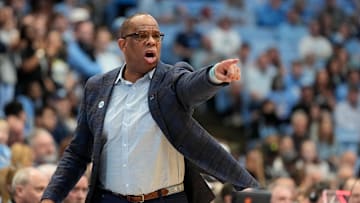 Mar 1, 2025; Chapel Hill, North Carolina, USA;  North Carolina Tar Heels head coach Hubert Davis reacts in the first half at Dean E. Smith Center. Mandatory Credit: Bob Donnan-Imagn Images