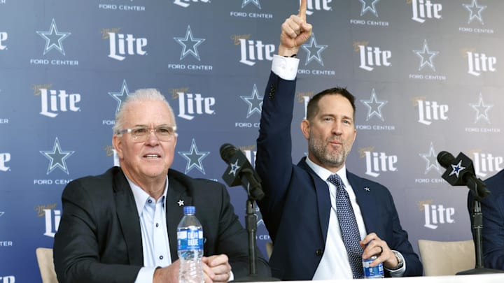 Dallas Cowboys CEO Stephen Jones and head coach Brian Schottenheimer speak to the media at a press conference.
