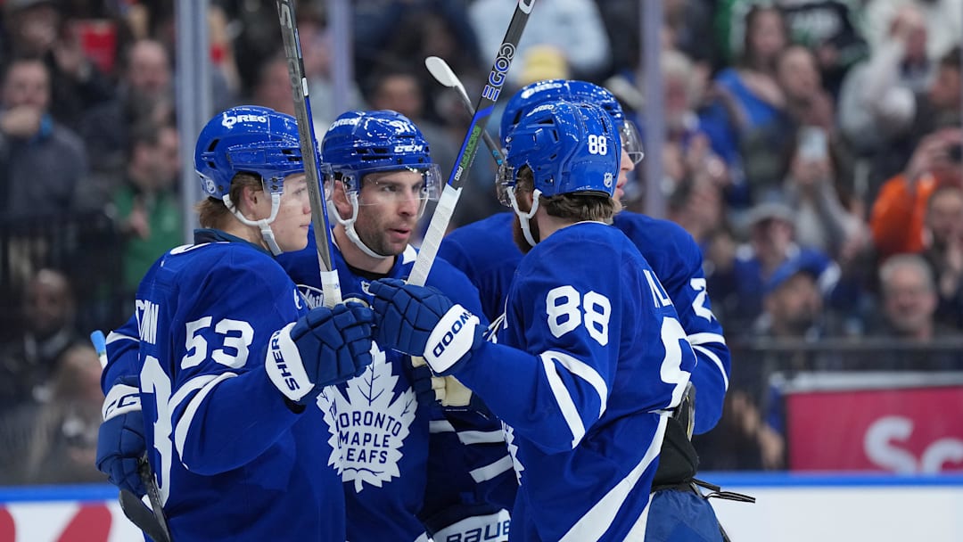Apr 13, 2026; Toronto, Ontario, CAN; Toronto Maple Leafs center John Tavares (91) scores a goal and celebrates with right wing William Nylander (88) against the Dallas Stars during the first period at Scotiabank Arena. Mandatory Credit: Nick Turchiaro-Imagn Images