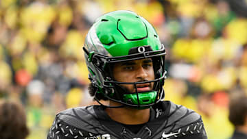 Oct 11, 2025; Eugene, Oregon, USA; Oregon Ducks quarterback Dante Moore (5) looks on during warmups before the game against the Indiana Hoosiers at Autzen Stadium. Mandatory Credit: Troy Wayrynen-Imagn Images