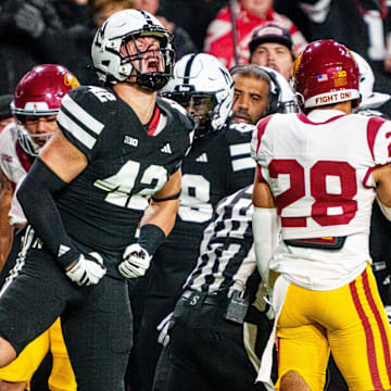 Nov 1, 2025; Lincoln, Nebraska, USA; Nebraska Cornhuskers linebacker Derek Wacker (42) celebrates after a tackle against the Southern California Trojans during the second quarter at Memorial Stadium. 