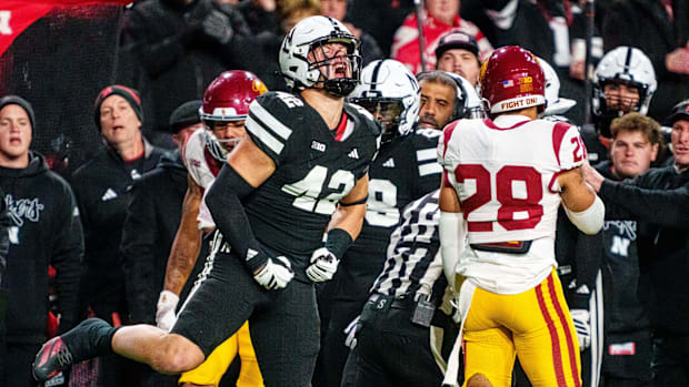 Nebraska linebacker Derek Wacker celebrates tackle against USC. 
