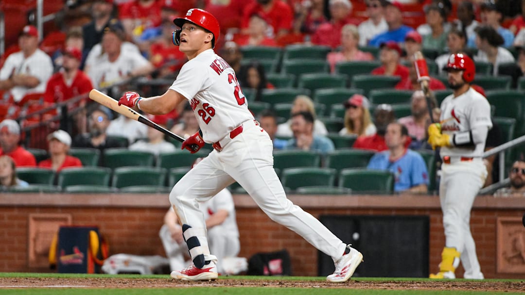 Apr 14, 2026; St. Louis, Missouri, USA; St. Louis Cardinals second baseman JJ Wetherholt (26) hits a two run home run for his second home run of the game against the Cleveland Guardians during the eighth inning at Busch Stadium. Mandatory Credit: Jeff Curry-Imagn Images