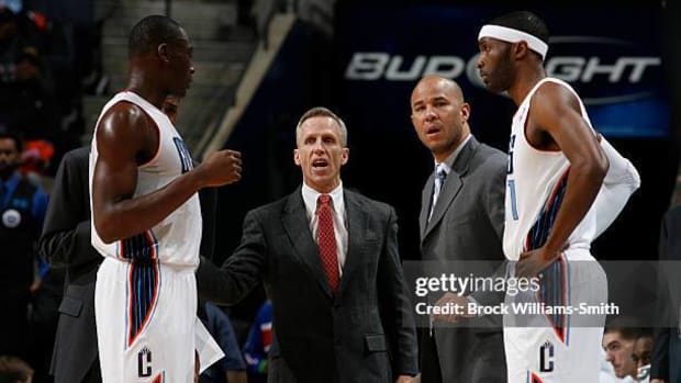 Mike Dunlap and Bismack Biyombo