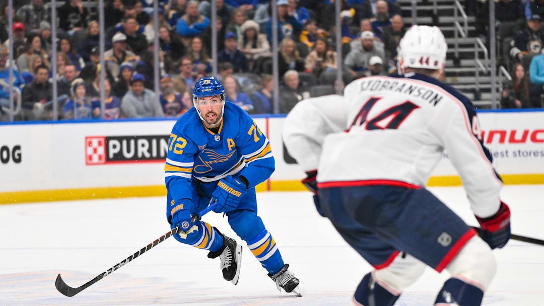 Jan 31, 2026; St. Louis, Missouri, USA; St. Louis Blues defenseman Justin Faulk (72) controls the puck against the Columbus Blue Jackets during the second period at Enterprise Center. Mandatory Credit: Jeff Curry-Imagn Images