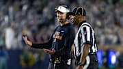 Oct 18, 2025; South Bend, Indiana, USA; Southern California Trojans head coach Lincoln Riley talks to an official during the first half against the Notre Dame Fighting Irish at Notre Dame Stadium. Mandatory Credit: Michael Caterina-Imagn Images
