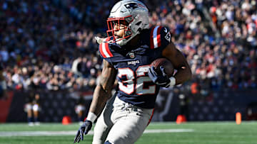 Nov 2, 2025; Foxborough, Massachusetts, USA; New England Patriots running back TreVeyon Henderson (32) runs the ball during the first half against the Atlanta Falcons at Gillette Stadium. 