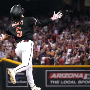 Arizona Diamondbacks center fielder Alek Thomas (5) celebrates after hitting a two-run home run against the Philadelphia Phillies during the eighth inning in game four of the NLCS of the 2023 MLB playoffs at Chase Field in Phoenix on Oct. 20, 2023.