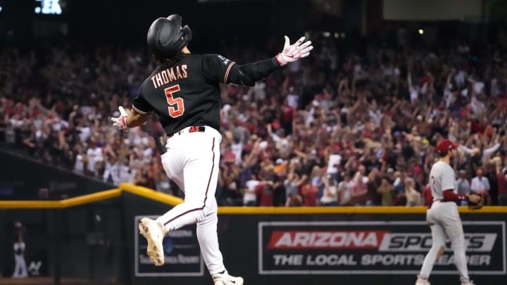Arizona Diamondbacks center fielder Alek Thomas (5) celebrates after hitting a two-run home run against the Philadelphia Phillies during the eighth inning in game four of the NLCS of the 2023 MLB playoffs at Chase Field in Phoenix on Oct. 20, 2023.