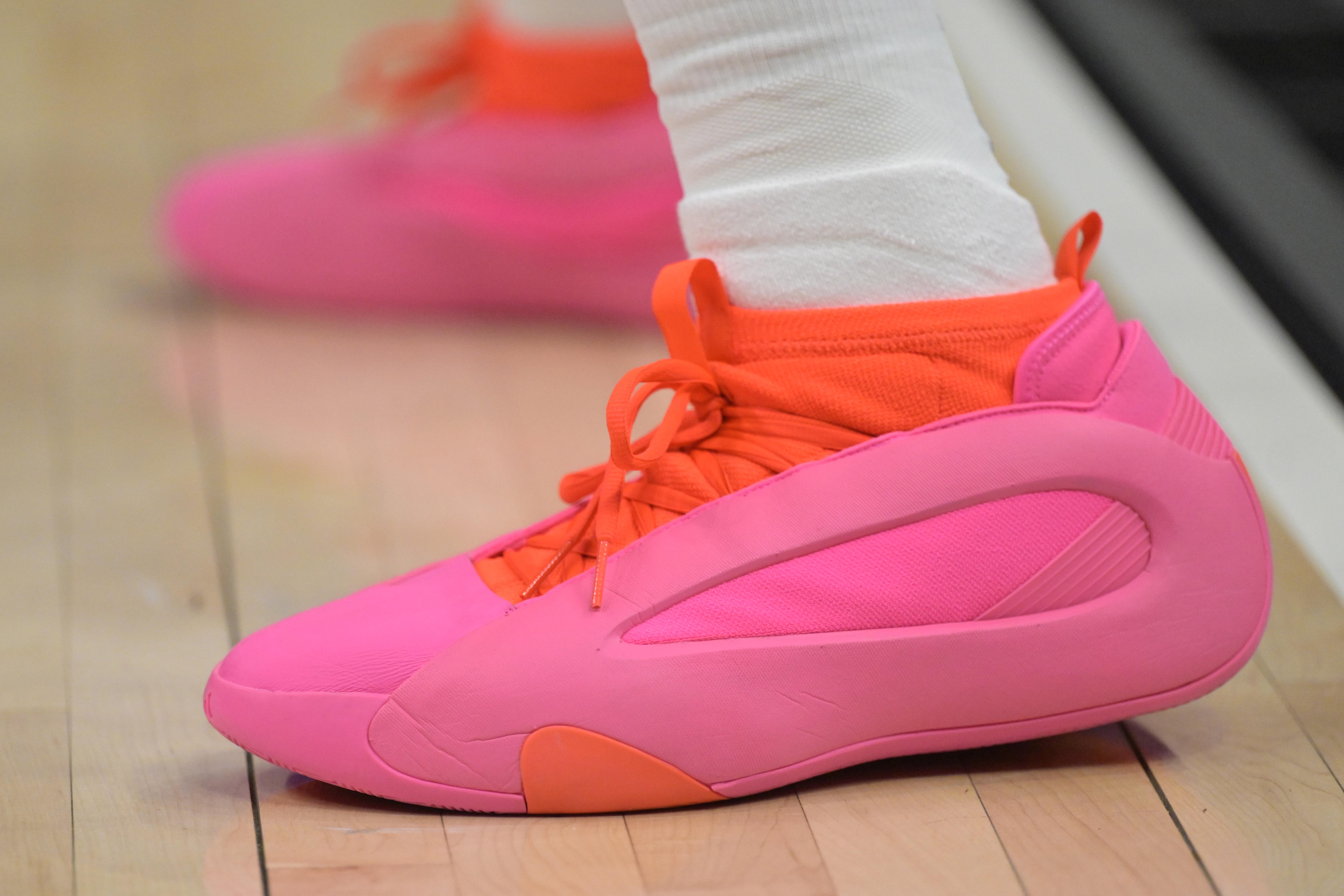 LA Clippers guard James Harden's pink and orange adidas sneakers.