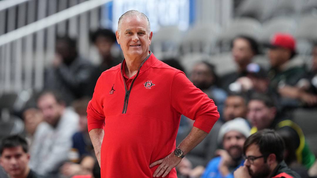 Dec 21, 2024; San Jose, California, USA; San Diego State Aztecs head coach Brian Dutcher stands on the sideline during the first half against the California Golden Bears at SAP Center Dec 21, 2024; San Jose, California, USA; San Diego State Aztecs head coach Brian Dutcher stands on the sideline during the first half against the California Golden Bears at SAP Center