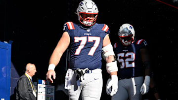 Nov 2, 2025; Foxborough, Massachusetts, USA; New England Patriots center Ben Brown (77) walks out of the player's tunnel before a game against the Atlanta Falcons at Gillette Stadium.