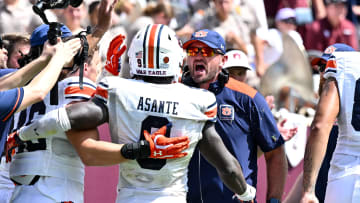 Sep 23, 2023; College Station, Texas, USA; Auburn Tigers linebacker coach Josh Aldridge reacts after linebacker Eugene Asante (9) touch down during the third quarter against the Texas A&M Aggies at Kyle Field. Mandatory Credit: Maria Lysaker-USA TODAY Sports