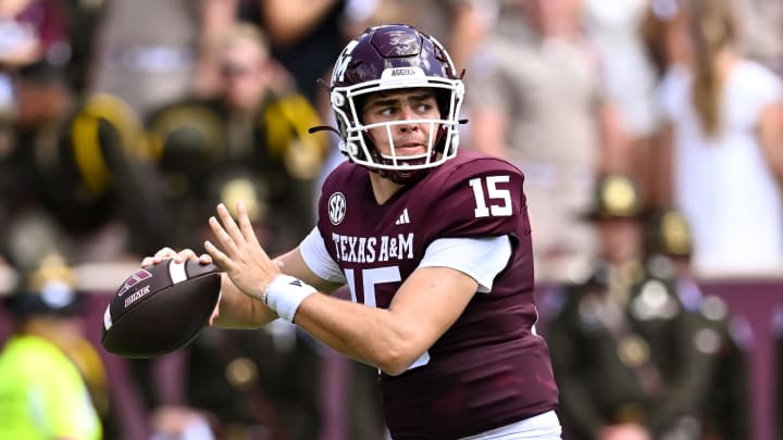 Sep 23, 2023; College Station, Texas, USA; Texas A&M Aggies quarterback Conner Weigman (15) in action during the second quarter against the Auburn Tigers at Kyle Field. Mandatory Credit: Maria Lysaker-USA TODAY Sports