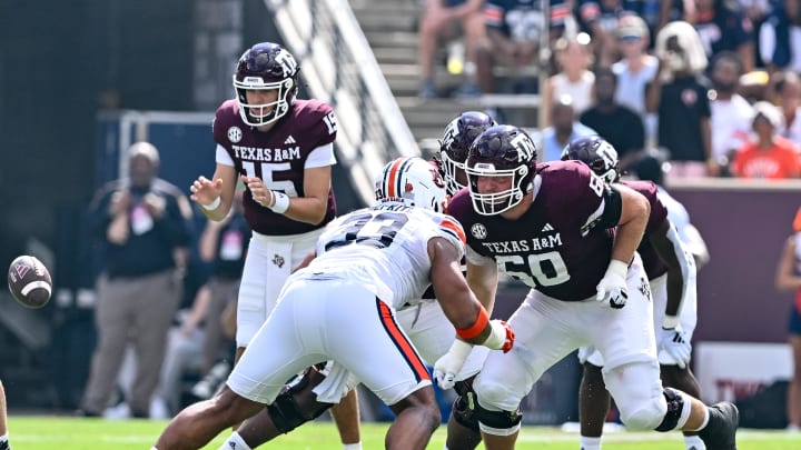 Sep 23, 2023; College Station, Texas, USA; Texas A&M Aggies offensive lineman Trey Zuhn III (60) in action during the first quarter at Kyle Field. Mandatory Credit: Maria Lysaker-USA TODAY Sports