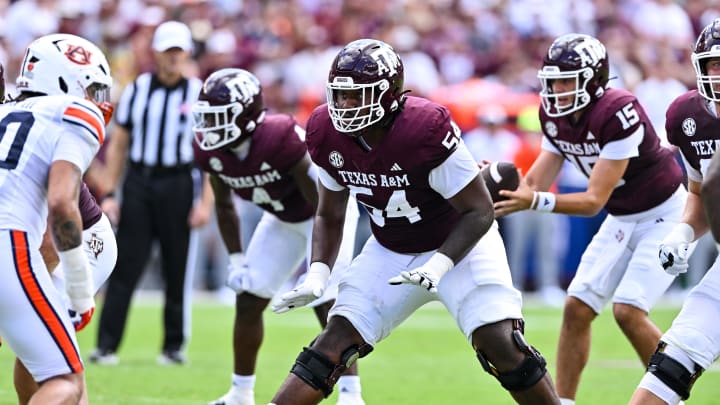 Sep 23, 2023; College Station, Texas, USA; Texas A&M Aggies offensive lineman Mark Nabou Jr. (54) in action during the first half against the Auburn Tigers at Kyle Field. Mandatory Credit: Maria Lysaker-USA TODAY Sports