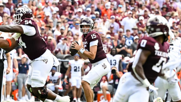 Sep 23, 2023; College Station, Texas, USA; Texas A&M Aggies quarterback Conner Weigman (15) throws a pass during the first quarter against the Auburn Tigers at Kyle Field. Mandatory Credit: Maria Lysaker-USA TODAY Sports