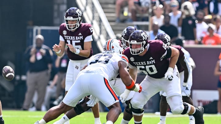 Sep 23, 2023; College Station, Texas, USA; Texas A&M Aggies offensive lineman Trey Zuhn III (60) in action during the first quarter at Kyle Field. Mandatory Credit: Maria Lysaker-USA TODAY Sports