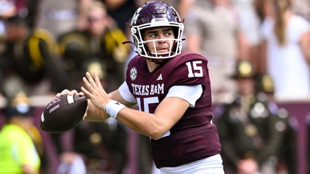 Sep 23, 2023; College Station, Texas, USA; Texas A&M Aggies quarterback Conner Weigman (15) in action during the second quarter against the Auburn Tigers at Kyle Field. Mandatory Credit: Maria Lysaker-USA TODAY Sports