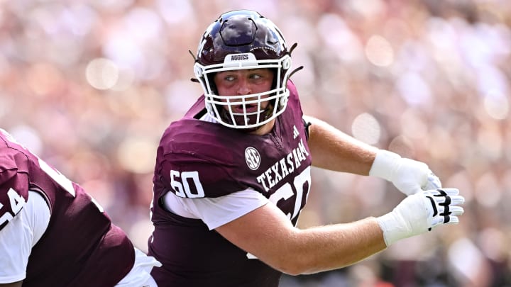 Sep 23, 2023; College Station, Texas, USA; Texas A&M Aggies offensive lineman Trey Zuhn III (60) in action during the first quarter against the Auburn Tigers at Kyle Field. 