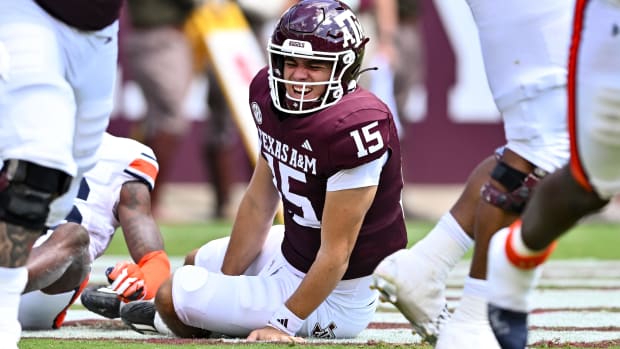 Texas A&M Aggies quarterback Conner Weigman reacts after getting hit during the second quarter.